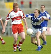 28 July 2007; Colin Devlin, Derry, in action Joe Higgins, Laois. Bank of Ireland All-Ireland Senior Football Championship Qualifier, Round 3, Laois v Derry, Kingspan Breffni Park, Cavan. Picture credit: Ray Lohan / SPORTSFILE