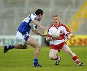 28 July 2007; Colin Devlin, Derry, in action against Cathal Ryan, Laois. Bank of Ireland All-Ireland Senior Football Championship Qualifier, Round 3, Laois v Derry, Kingspan Breffni Park, Cavan. Picture credit: Ray Lohan / SPORTSFILE