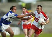 28 July 2007; Patrick Bradley, Derry, in action against Tom Kelly, Laois, Bank of Ireland All-Ireland Senior Football Championship Qualifier, Round 3, Laois v Derry, Kingspan Breffni Park, Cavan. Picture credit: Ray Lohan / SPORTSFILE