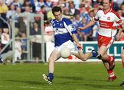 28 July 2007; Laois' Pauric McMahon shoots to score his sides goal. Derry. Bank of Ireland All-Ireland Senior Football Championship Qualifier, Round 3, Laois v Derry, Kingspan Breffni Park, Cavan. Picture credit: Ray Lohan / SPORTSFILE