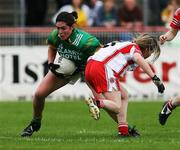 28 July 2007; Nora Stapleton, Donegal, in action against Joline Donnelly, Tyrone. TG4 Ladies All-Ireland Senior Football Championship, Group 3, Tyrone v Donegal. Healy Park, Omagh, Co. Tyrone. Picture credit; Oliver McVeigh / SPORTSFILE