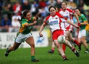 28 July 2007; Gemma Begley, Tyrone, in action against Nicola Lacey, Donegal. TG4 Ladies All-Ireland Senior Football Championship, Group 3, Tyrone v Donegal. Healy Park, Omagh, Co. Tyrone. Picture credit; Oliver McVeigh / SPORTSFILE