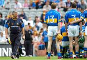 28 July 2007; Tipperary manager Michael Babs Keating watches as his team line up for the team photograph before the game. Guinness All-Ireland Senior Hurling Championship Quarter-Final, Wexford v Tipperary, Croke Park, Dublin. Picture credit; Brendan Moran / SPORTSFILE