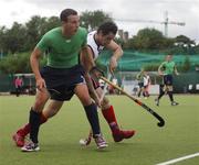 29 July 2007; Tim Lewis, Ireland, in action against Glenn Turner, Australia Institute of Sport. Men's Hockey International, Ireland v Australia Institute of Sport, The National Hockey Stadium, University College Dublin, Belfield, Dublin. Picture credit; Stephen McCarthy / SPORTSFILE