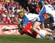29 July 2007; Aidan Kearney, Waterford, fouls Kieran Murphy, Cork, to concede a penalty during the second half. Guinness All-Ireland Senior Hurling Championship Quarter-Final, Cork v Waterford, Croke Park, Dublin. Picture credit; David Maher / SPORTSFILE