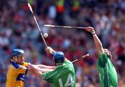 29 July 2007; Frank Lohan, Clare, in action against Brian Begley, and Andrew O'Shaughnessy, Limerick. Guinness All-Ireland Senior Hurling Championship Quarter-Final, Clare v Limerick, Croke Park, Dublin. Picture credit; David Maher / SPORTSFILE