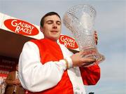 31 July 2007; Jockey Davy Moran celebrates with the trophy after his mount Incline won The Tote Galway Mile E.B.F. Handicap. Galway Racecourse, Ballybrit, Co. Galway. Picture credit; Pat Murphy / SPORTSFILE