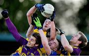 9 February 2014; Brian Malone and James Breen, Wexford, in action against Kevin Higgins and Donie Shine, Roscommon. Allianz Football League, Division 3, Round 2, Roscommon v Wexford, Kiltoom, Co. Roscommon. Picture credit: David Maher / SPORTSFILE