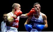22 February 2014; Darren Campbell, left, Glin Boxing Club, exchanges punches with Adam Courtney, St. Mary's Boxing Club, during their 52kg bout. National Senior Boxing Championships, First Round, National Stadium, Dublin. Picture credit: Barry Cregg / SPORTSFILE