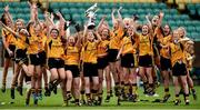 5 April 2014; Coláiste Íosagáin team captain Aedini Ni Dhonaill lifts the cup as her team-mates celebrate. TESCO HomeGrown Post Primary School Senior A Final, Coláiste Dún Iascaigh, Cahir v Coláiste Íosagáin, Stillorgan. Dr. Cullen Park, Carlow. Picture credit: Matt Browne / SPORTSFILE