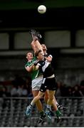 12 July 2014; Gearoid Hegarty, Limerick, in action against Adrian McIntyre and Kevin McDonnell, Sligo. GAA Football All-Ireland Senior Championship Round 3A, Sligo v Limerick, Markievicz Park, Sligo. Picture credit: Pat Murphy / SPORTSFILE