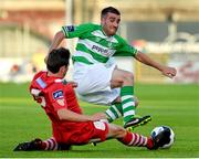 21 July 2014; Robert Bayly, Shamrock Rovers, in action against John Kavanagh, Cork City. EA Sports Cup, Quarter-Final, Shamrock Rovers v Cork City, Tallaght Stadium, Tallaght, Co. Dublin. Picture credit: David Maher / SPORTSFILE