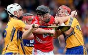 30 July 2014; Shane O'Keeffe, Cork, in action against Clare players, from left, Conor Cleary, Eoin Enright and Jack Browne. Bord Gais Energy Munster GAA Hurling Under 21 Championship Final, Cork v Clare. Cusack Park, Ennis, Co. Clare. Picture credit: Stephen McCarthy / SPORTSFILE