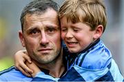31 August 2014; A tearful Alan Brogan of Dublin leaves the pitch with his son Jamie after defeat by Donegal. GAA Football All Ireland Senior Championship, Semi-Final, Dublin v Donegal, Croke Park, Dublin. Picture credit: Brendan Moran / SPORTSFILE