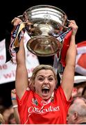 14 September 2014; Cork captain Anna Geary lifts the O'Duffy cup following her side's victory in the Liberty Insurance All Ireland Senior Camogie Championship Final match between Kilkenny and Cork at Croke Park in Dublin. Photo by Sportsfile