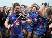 29 November 2014;  Lisa Leonard, Murroe Boher, plays the fiddle for her colleagues after winning the final . TESCO Homegrown All Ireland Junior Club Championship Final, Murroe Boher, Limerick v St. Ciaran's, Roscommon, Ballinasloe, Co. Galway. Picture credit: Ray Ryan / SPORTSFILE