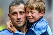 31 August 2014; A tearful Alan Brogan of Dublin leaves the pitch with his son Jamie after defeat by Donegal. GAA Football All Ireland Senior Championship, Semi-Final, Dublin v Donegal, Croke Park, Dublin. Picture credit: Brendan Moran / SPORTSFILE