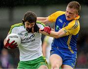 2 August 2014; Stephen McBrearty, Donegal, in action against Ronan Raftery, Roscommon. Electric Ireland GAA Football All-Ireland Minor Championship, Quarter Final, Donegal v Roscommon, Markievicz Park, Sligo. Picture credit: Matt Browne / SPORTSFILE