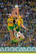 21 September 2014; Michael Murphy, left, and Rory Kavanagh, Donegal, contest a high ball with Kerry's David Moran and Johnny Buckley, behind. GAA Football All Ireland Senior Championship Final, Kerry v Donegal. Croke Park, Dublin. Picture credit: Pat Murphy / SPORTSFILE