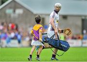 14 June 2014; Wexford goalkeeper Mark Fanning laughs with a young Wexford supporter at half time. Leinster GAA Hurling Senior Championship, Semi-Final, Wexford v Dublin, Wexford Park, Wexford. Picture credit: Dáire Brennan / SPORTSFILE