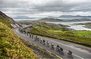 22 May 2014; The peloton ride towards Caherdaniel, Co. Kerry, during Stage 5 of the 2014 An Post Rás. Cahirciveen - Clonakilty. Picture credit: Ramsey Cardy / SPORTSFILE