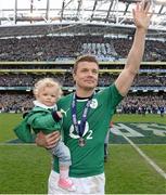8 March 2014; Ireland's Brian O'Driscoll with his daughter Sadie after the game. RBS Six Nations Rugby Championship, Ireland v Italy, Aviva Stadium, Lansdowne Road, Dublin. Picture credit: Brendan Moran / SPORTSFILE