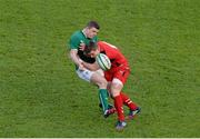 8 February 2014; Brian O'Driscoll, Ireland, drops the ball after he is tackled by Scott Williams, Wales. RBS Six Nations Rugby Championship, Ireland v Wales, Aviva Stadium, Lansdowne Road, Dublin. Picture credit: Brendan Moran / SPORTSFILE