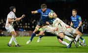 17 January 2014; Jamie Heaslip, Leinster, is tackled by Jeff Hassler and Justin Tipuric, right, Ospreys. Heineken Cup 2013/14, Pool 1, Round 6, Leinster v Ospreys, RDS, Ballsbridge, Dublin. Picture credit: Stephen McCarthy / SPORTSFILE