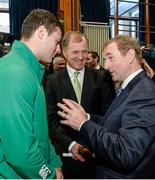 5 December 2014; In attendance at the announcement of the Irish Rugby Football Union, Irish Government and the Northern Ireland Executives' intention to submit a bid to host the 2023 Rugby World Cup in Ireland is An Taoiseach Enda Kenny TD, right, with former Ireland rugby international Hugo MacNeill, centre and current Ireland international Robbie Henshaw. Royal School, College Hill, Armagh. Picture credit: Oliver McVeigh / SPORTSFILE