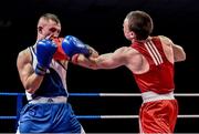 5 December 2014; Partick Mongan, right, exchanges punches with Colin Donovan during their 64kg bout. National Intermediate Boxing Championships, National Stadium, Dublin. Picture credit: Ramsey Cardy / SPORTSFILE