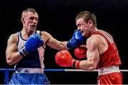 5 December 2014; Partick Mongan, right, exchanges punches with Colin Donovan during their 64kg bout. National Intermediate Boxing Championships, National Stadium, Dublin. Picture credit: Ramsey Cardy / SPORTSFILE