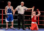 5 December 2014; Partick Mongan, right, celebrates after defeating Colin Donovan via unanimous decision in their 64kg bout. National Intermediate Boxing Championships, National Stadium, Dublin. Picture credit: Ramsey Cardy / SPORTSFILE