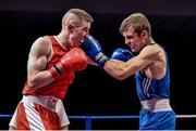 5 December 2014; Noel McBride, Corrib, left, exchanges punches with Sean Hunt, Palmerstown, during their 67kg bout. National Intermediate Boxing Championships, National Stadium, Dublin. Picture credit: Ramsey Cardy / SPORTSFILE