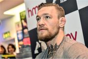 6 December 2014; UFC star Conor ‘The Notorious’ McGregor in HMV Grafton Street during a signing of his new DVD 'Notorious'. HMV, Grafton Street, Dublin. Picture credit: Ramsey Cardy / SPORTSFILE