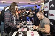 6 December 2014; UFC star Conor ‘The Notorious’ McGregor in HMV Grafton Street during a signing of his new DVD 'Notorious'. HMV, Grafton Street, Dublin. Picture credit: Ramsey Cardy / SPORTSFILE