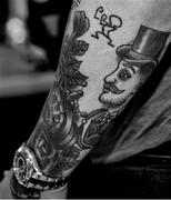 6 December 2014; A detail view of a tattoo on the arm of UFC star Conor ‘The Notorious’ McGregor in HMV Grafton Street during a signing of his new DVD 'Notorious'. HMV, Grafton Street, Dublin. Picture credit: Ramsey Cardy / SPORTSFILE