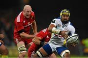 6 December 2014; Fritz Lee, ASM Clermont Auvergne, is tackled by BJ Botha and Paul O'Connell, Munster. European Rugby Champions Cup 2014/15, Pool 1, Round 3, Munster v ASM Clermont Auvergne, Thomond Park, Limerick. Diarmuid Greene / SPORTSFILE