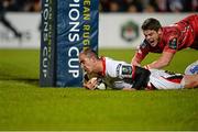 6 December 2014; Ruan Pienaar, Ulster, scores a try despite the tackle of Rhys Priestland, Scarlets. European Rugby Champions Cup 2014/15, Pool 3, Round 3, Ulster v Scarlets, Kingspan Stadium, Ravenhill Park, Belfast, Co. Antrim. Picture credit: Oliver McVeigh / SPORTSFILE