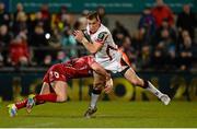 6 December 2014; Craig Gilroy, Ulster, is tackled by Harry Robinson, Scarlets. European Rugby Champions Cup 2014/15, Pool 3, Round 3, Ulster v Scarlets, Kingspan Stadium, Ravenhill Park, Belfast, Co. Antrim. Picture credit: Oliver McVeigh / SPORTSFILE