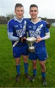 6 December 2014; St Mary's Denis and Daniel Daly with the Jack Murphy Cup following their South Kerry Championship Final victory. South Kerry Championship Final Replay, St Mary's v Waterville. Con Keating Park, Cahersiveen, Co. Kerry. Picture credit: Stephen McCarthy / SPORTSFILE