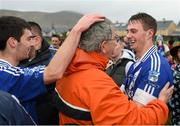 6 December 2014; St Mary's Paul O'Donoghue is congratulated following his side's South Kerry Championship Final victory. South Kerry Championship Final Replay, St Mary's v Waterville. Con Keating Park, Cahersiveen, Co. Kerry. Picture credit: Stephen McCarthy / SPORTSFILE