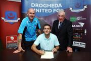 31 July 2007; Drogheda United manager Paul Doolin, left, and chairman Vincent Hoey, right, with Guy Bates from Newcastle as he signs for Drogheda United. Clarion Hotel Dublin Airport, Dublin Airport, Dublin. Photo by Sportsfile