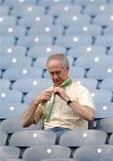 4 August 2007; A Meath fan adjusts his scarf before the start of the match. Bank of Ireland Football Championship Quarter Final, Tyrone v Meath, Croke Park, Dublin. Picture Credit; Brian Lawless / SPORTSFILE