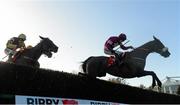 7 December 2014; Don Cossack, with Brian O'Connell up, clears the last ahead of Boston Bob, with Ruby Walsh up, on their way to winning the John Durkan Memorial Punchestown Steeplechase. Punchestown Racecourse, Punchestown, Co. Kildare. Picture credit: Barry Cregg / SPORTSFILE