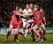 6 December 2014; Ruan Pienaar, Ulster, is tackled by Scott Williams and Aled Davies, Scarlets. European Rugby Champions Cup 2014/15, Pool 3, Round 3, Ulster v Scarlets, Kingspan Stadium, Ravenhill Park, Belfast, Co. Antrim. Picture credit: Oliver McVeigh / SPORTSFILE