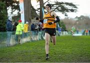 7 December 2014; Ben Thistlewood, Leevale AC, 562, crosses the finish line to win the Novice Men's race at the GloHealth Novice and Juvenile Uneven Age Cross Country Championships. Santry Demesne, Santry, Dublin. Picture credit: Pat Murphy / SPORTSFILE