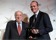 8 December 2014; Former trainer Mick O'Toole is presented with the Contribution to the Industry Award by Simon Coveney TD, Minister for Agriculture, Food and the Marine. Horse Racing Ireland Awards 2014. Leopardstown Racecourse, Leopardstown, Co. Dublin. Picture credit: Barry Cregg / SPORTSFILE