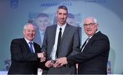 10 December 2014; January award winner Colin O'Reilly, player/coach of C&S UCC Demons, is presented with his award by Minister of State for Tourism and Sport, Michael Ring T.D, left, and Cel O'Reilly, Managing Director, Philips Electronics Ireland. Philips Sports Manager of the Year 2014, Shelbourne Hotel, Dublin. Picture credit: Matt Browne / SPORTSFILE