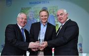 10 December 2014; March award winner Joe Schmidt, Ireland rugby head coach, is presented with his award by Minister of State for Tourism and Sport, Michael Ring T.D, left, and Cel O'Reilly, Managing Director, Philips Electronics Ireland. Philips Sports Manager of the Year 2014, Shelbourne Hotel, Dublin. Picture credit: Matt Browne / SPORTSFILE