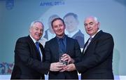 10 December 2014; April award winner Jim Gavin, Dublin senior football manager, is presented with his award by Minister of State for Tourism and Sport, Michael Ring T.D, left, and Cel O'Reilly, Managing Director, Philips Electronics Ireland. Philips Sports Manager of the Year 2014, Shelbourne Hotel, Dublin. Picture credit: Matt Browne / SPORTSFILE